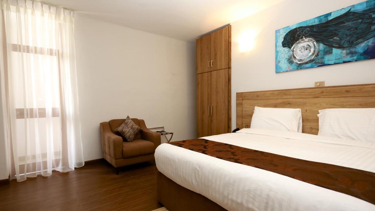 Black Horse Hotel Apartment Аддис-Абеба Экстерьер фото