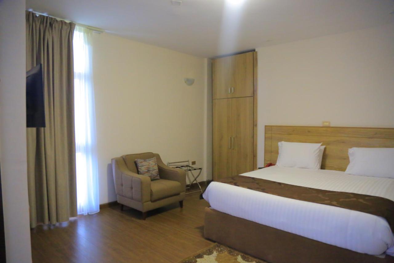 Black Horse Hotel Apartment Аддис-Абеба Экстерьер фото