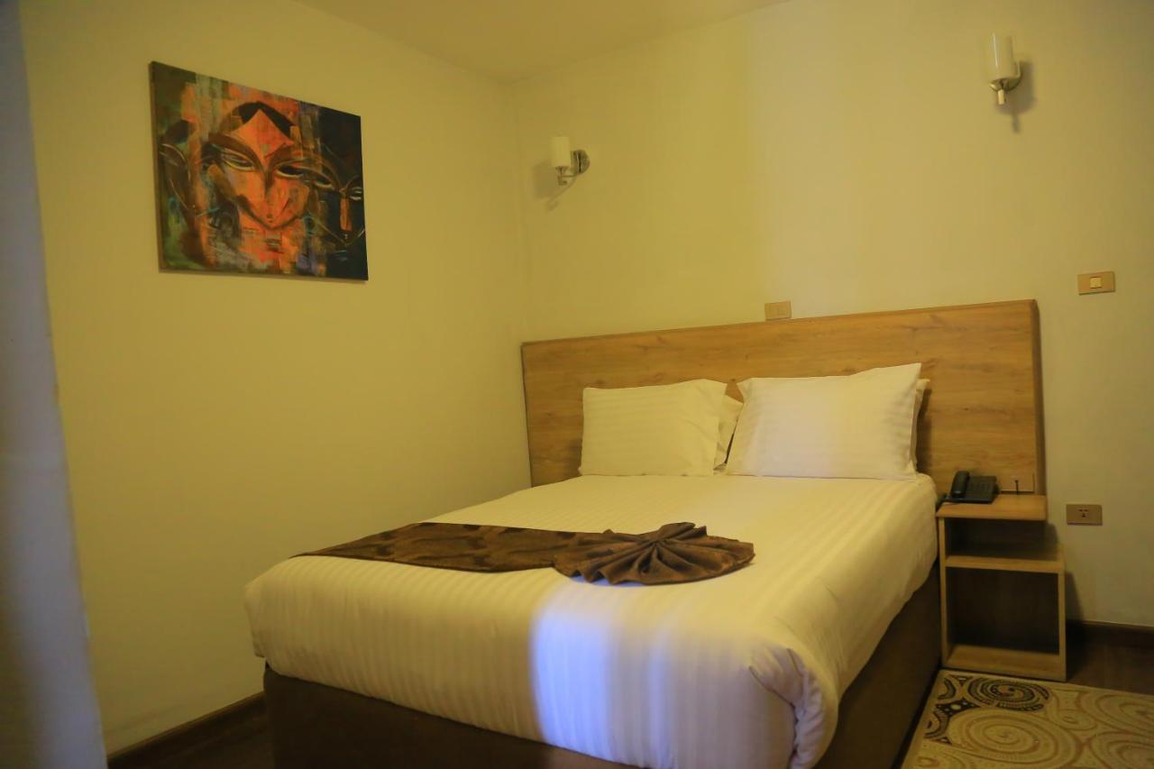 Black Horse Hotel Apartment Аддис-Абеба Экстерьер фото
